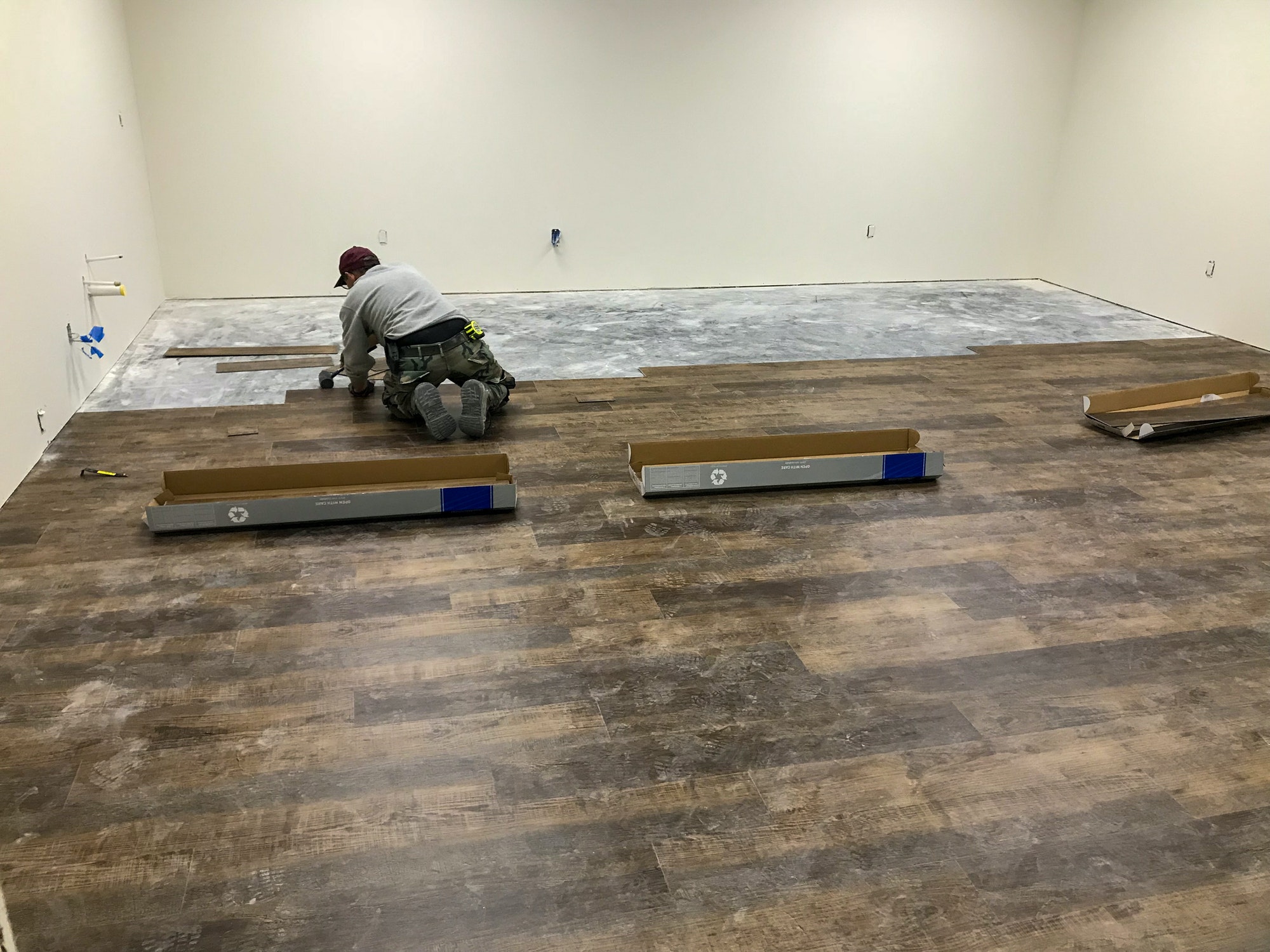 putting down laminate flooring